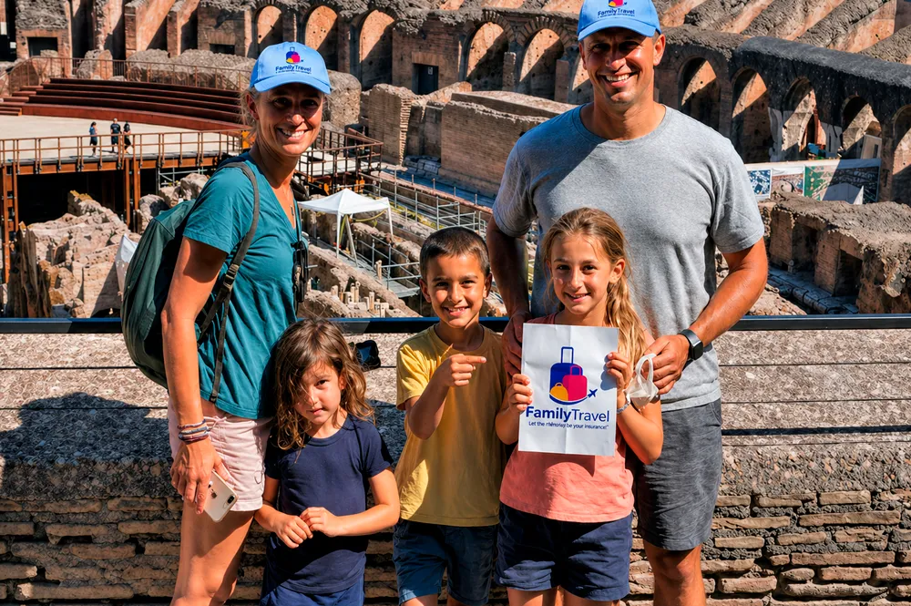 Happy family walking in a sunny European town street